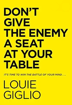 Cover of Don’t Give the Enemy a Seat at Your Table by Louie Giglio